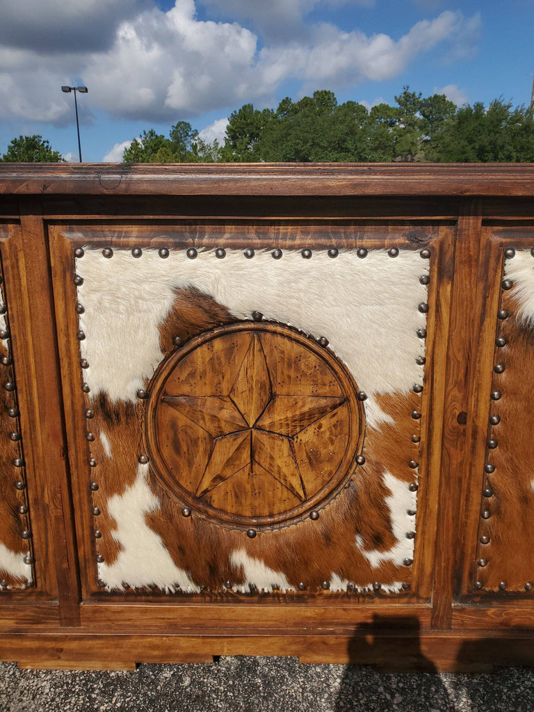 TRADITIONAL COWHIDE EXECUTIVE DESK WITH COWHIDE AND STAR - The Rustic Mile